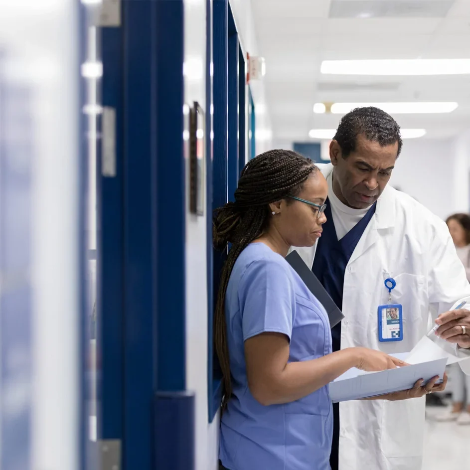 Doctor and Nurse discussing a file